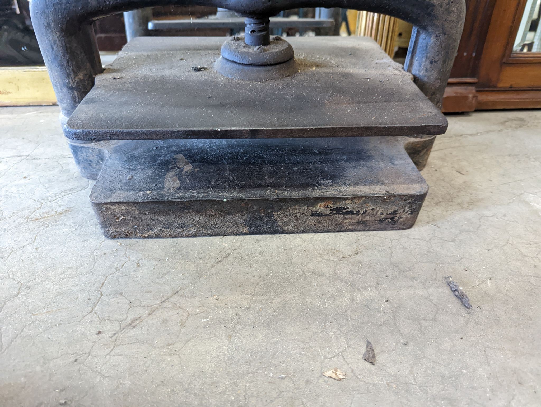 A Victorian cast iron book press, width 40cm, height 36cm